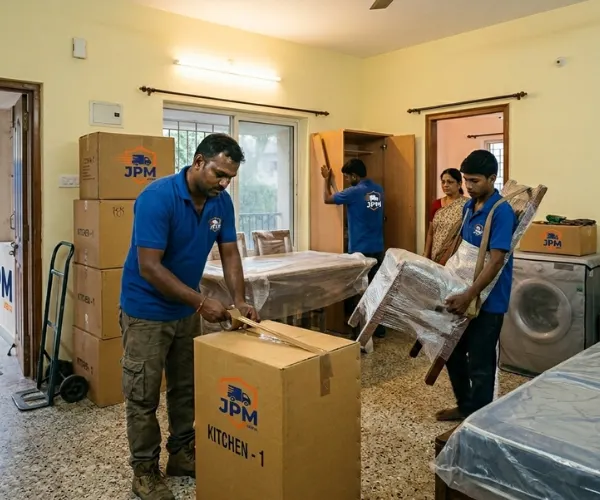 workers-packing-boxes-for-office-relocation-jeeva-packer-and-movers